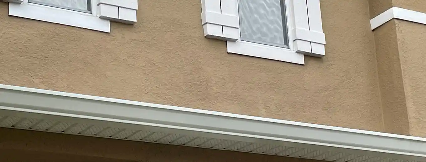 A finished, repainted stucco repair, Central Florida example