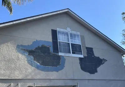 The extent of an opened wall during a stucco repair