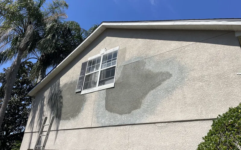 A rebuilt stucco wall after water damage repair, Central Florida example