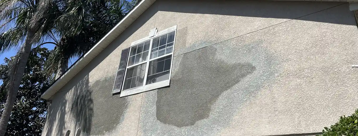 A rebuilt stucco wall after water damage repair, Central Florida example